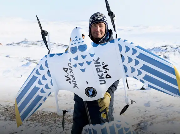 Kirt Ejesiak, owner of Arctic UAV, holding one of his drones